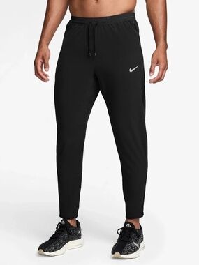 Nike Stride Dri-FIT Woven Running Trousers in Black - Size Medium